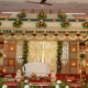 Fabulous Wedding Stage decorated with full of flowers by Leading Wedding Event Planner.